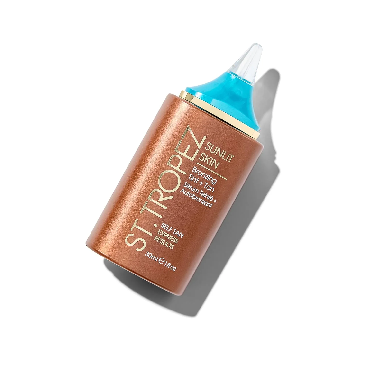 St.Tropez Sunlit Skin Бронзирующий тинт и жидкий бронзер для лица и кожи, создающий эффект загара благодаря гиалуроновой кислоте, 1 жидкая унция 29,6 мл (1 шт.)