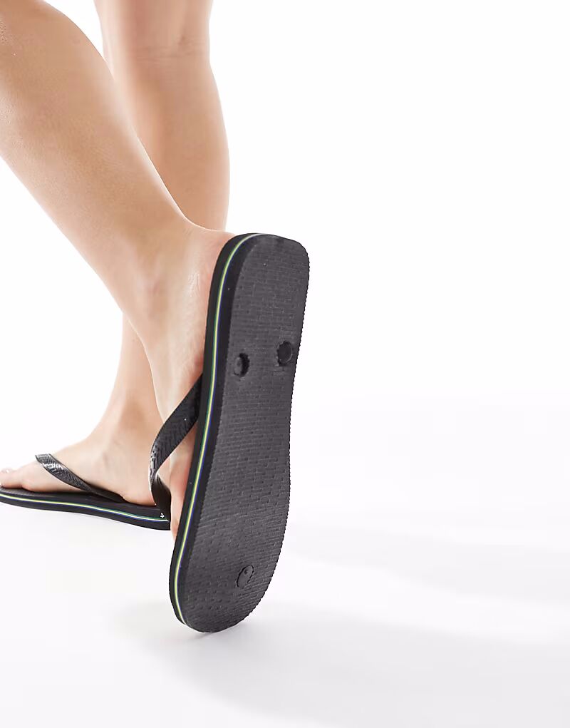 Шлепанцы унисекс с бразильским логотипом Havaianas черного цвета — фото 4