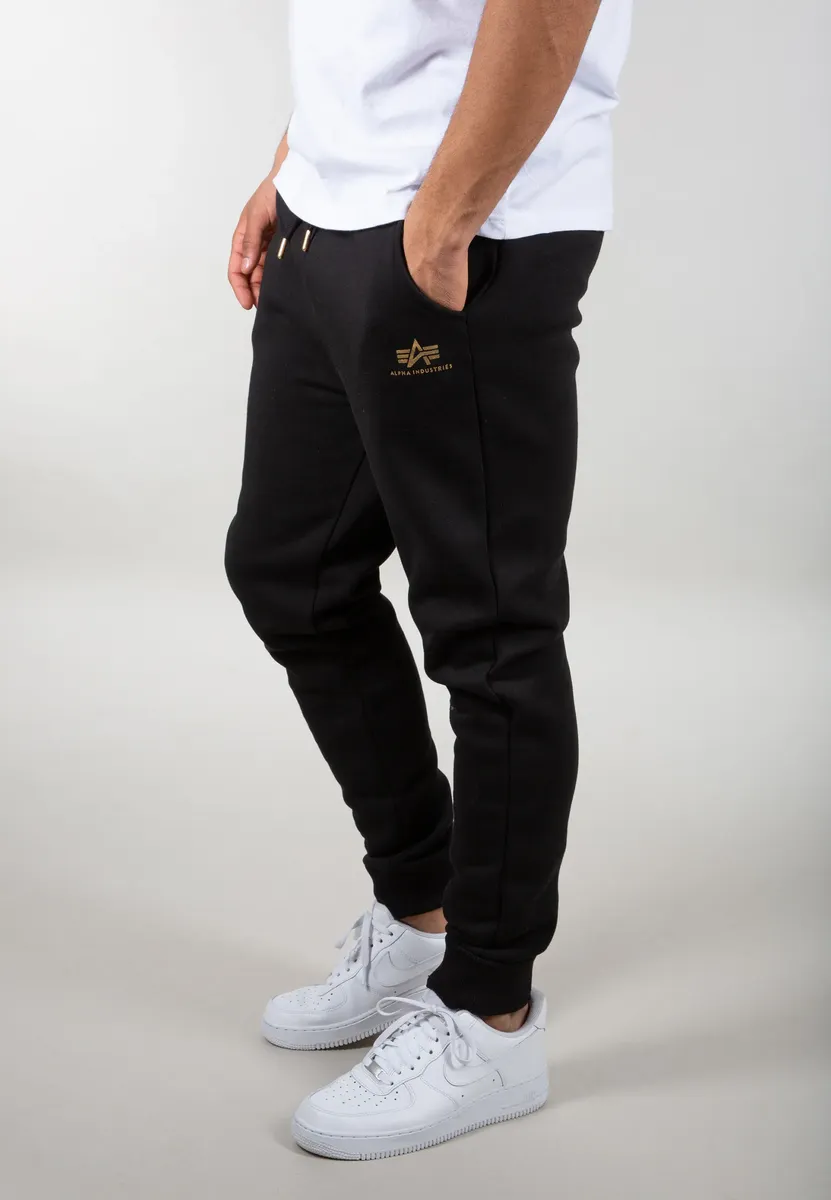 

Брюки для бега Alpha Industries " Alpha Industries Мужчины - Jogger Basic Jogger SL Foil Print", цвет Black/Yellow Gold