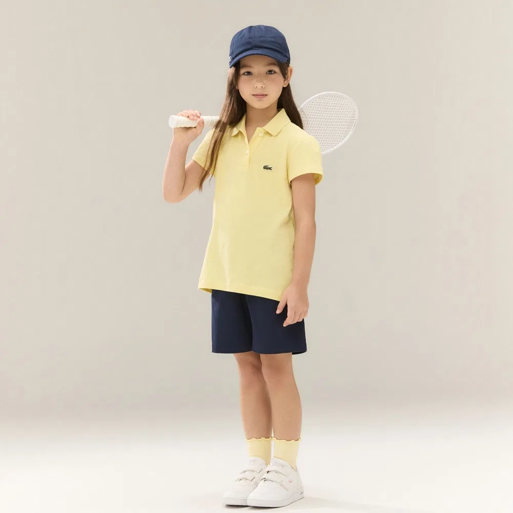 Детская рубашка-поло с пышными рукавами светло-жёлтая от Lacoste — фото 2