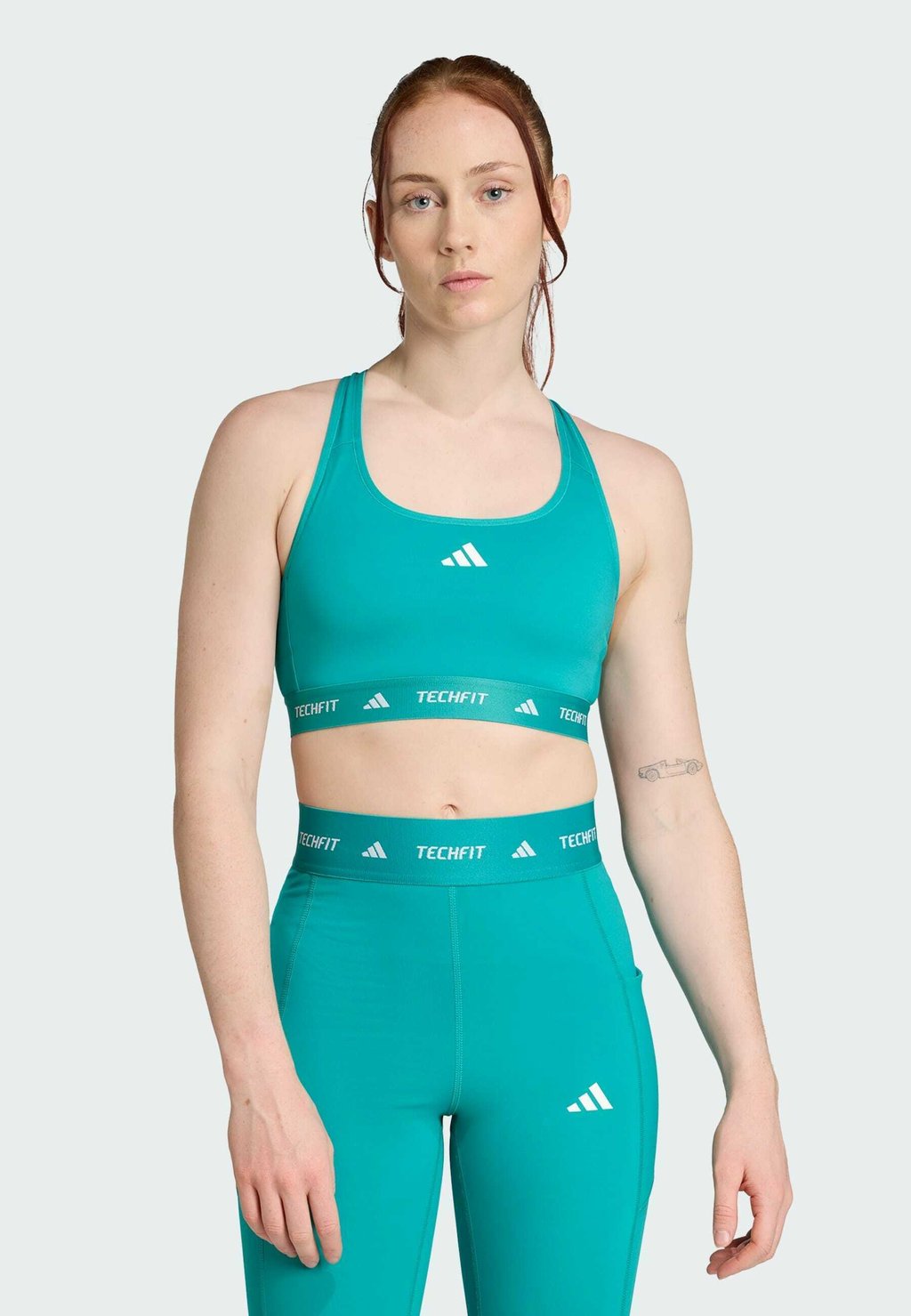 

Спортивный бюстгальтер средней поддержки Adidas Performance, цвет Pure Teal