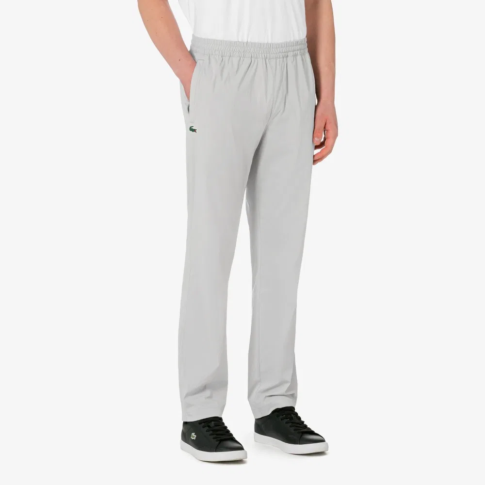 Мужские лёгкие серые брюки из тканого материала от Lacoste — фото 2