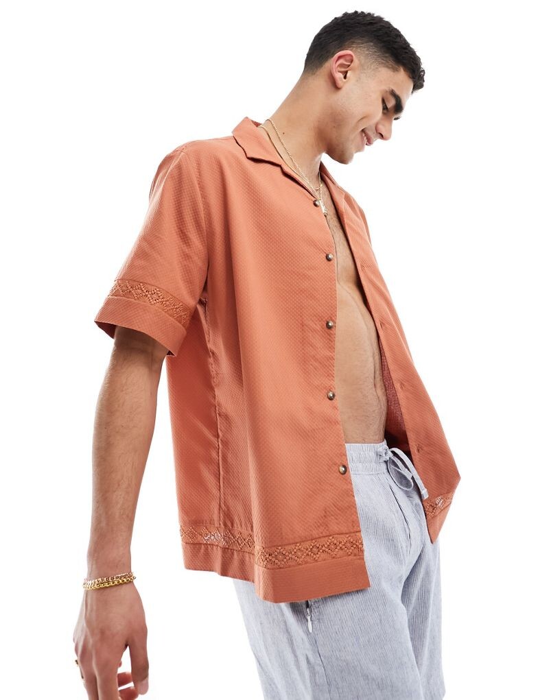 

Оранжевая свободная фактурная рубашка ASOS DESIGN Revere