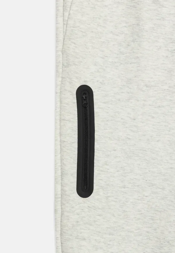 Спортивные штаны Nike Sportswear Tech, светло-серый/меланж/черный — фото 3