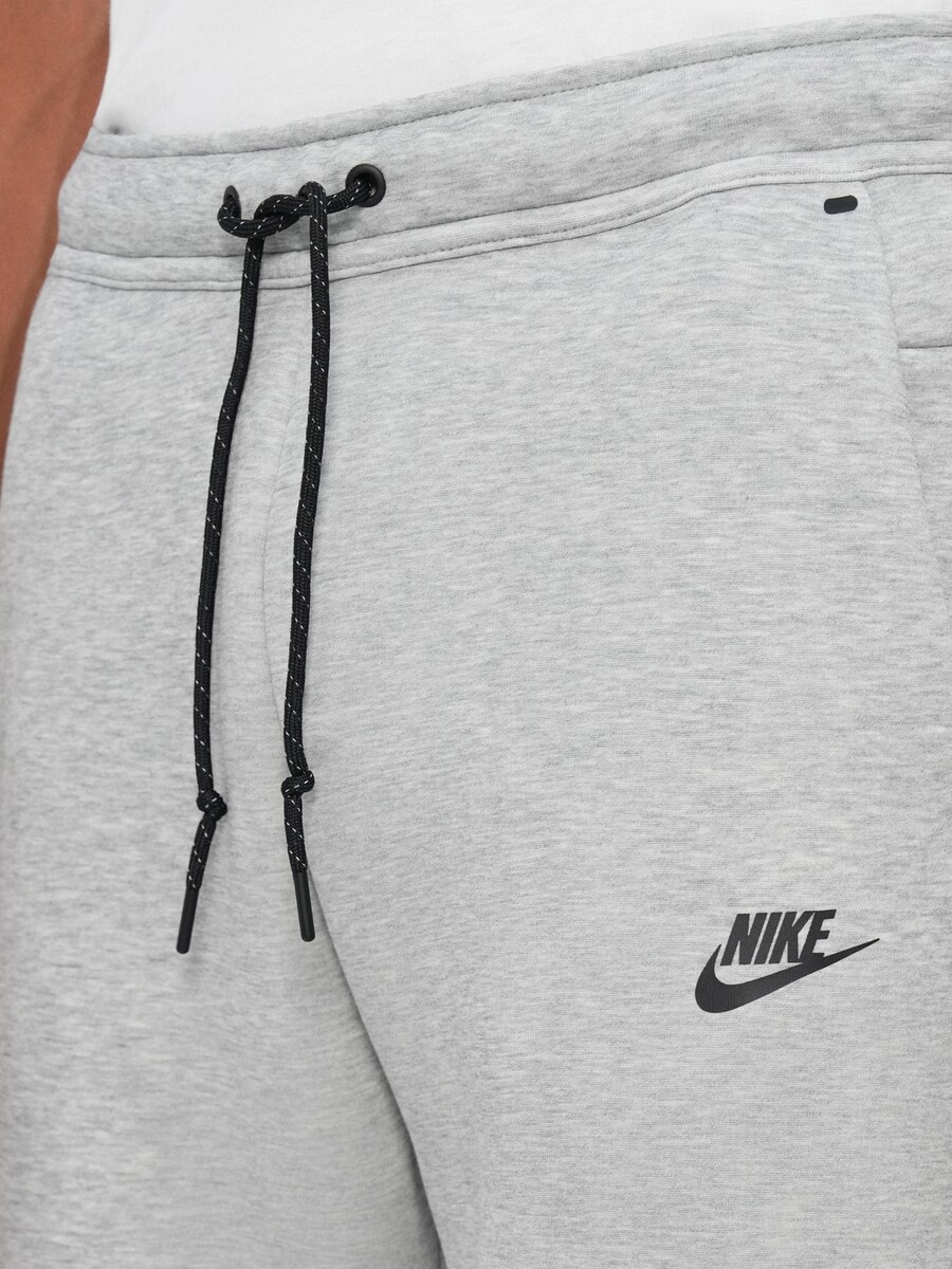 Обычные брюки Nike Sportswear TECH FLC, светло-серый — фото 2
