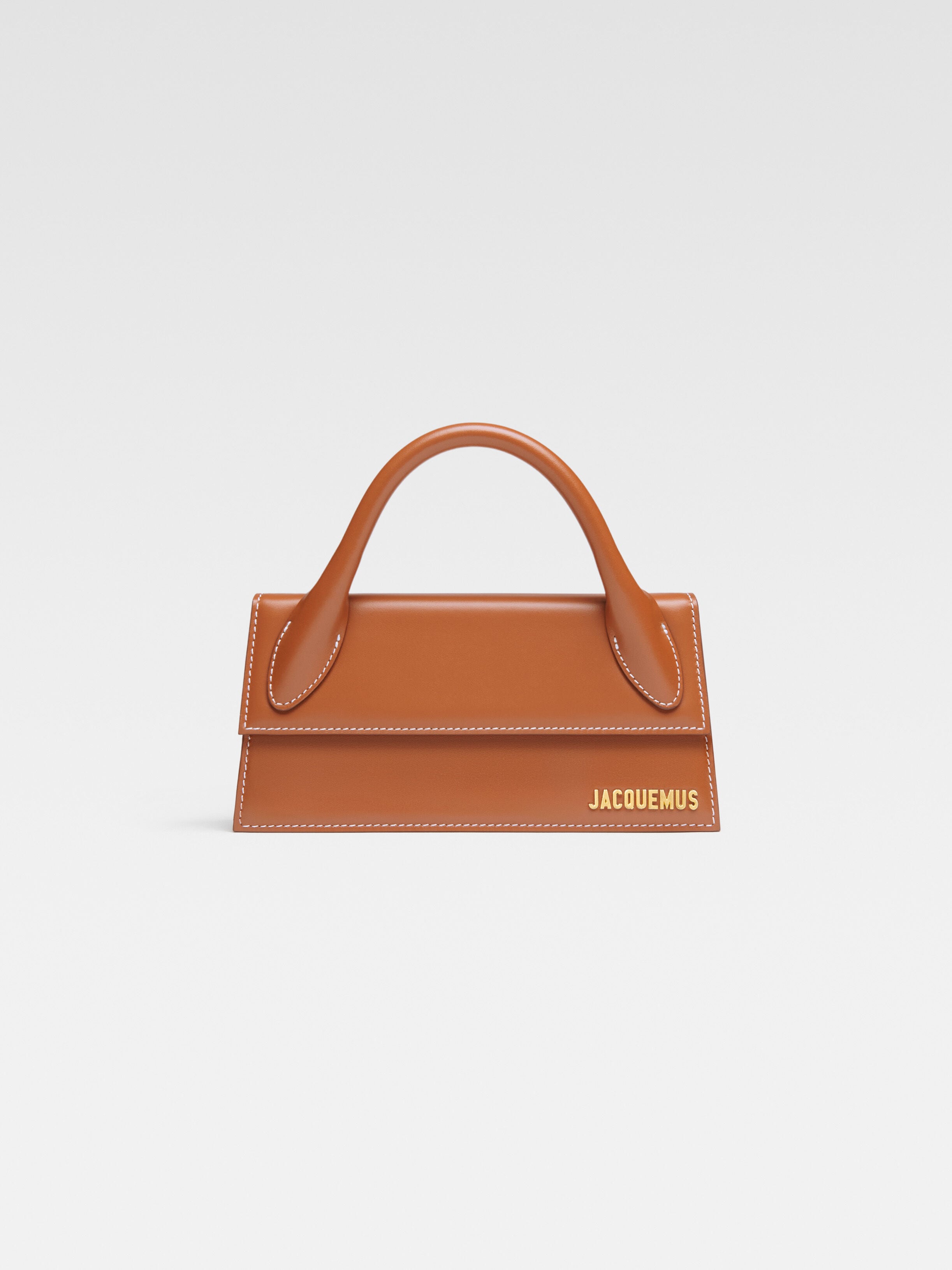 

Длинная фирменная сумочка JACQUEMUS The long Chiquito, светло-коричневый