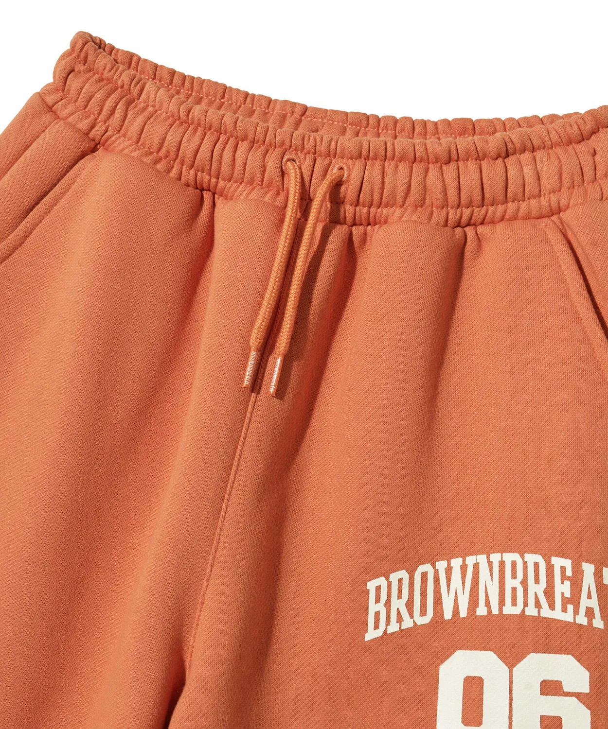 Детские флисовые спортивные брюки «Футбол» оранжевые от Brownbreath Kids — фото 4