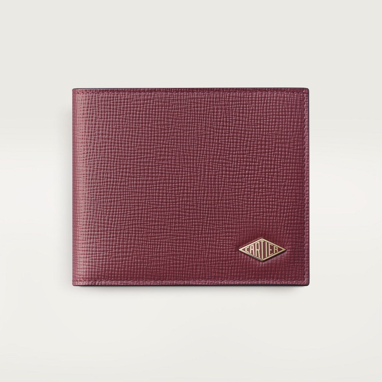 

Кошелек Cartier Portefeuille compact 6 cartes de crédit, Cartier Losange, телячья кожа бордового цвета с зернистой отделкой
