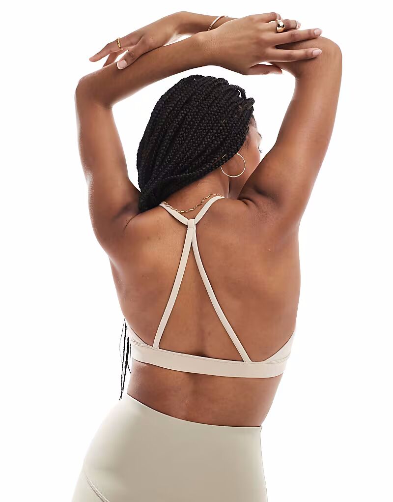 

Спортивный бюстгальтер Agon Strappy песочного цвета