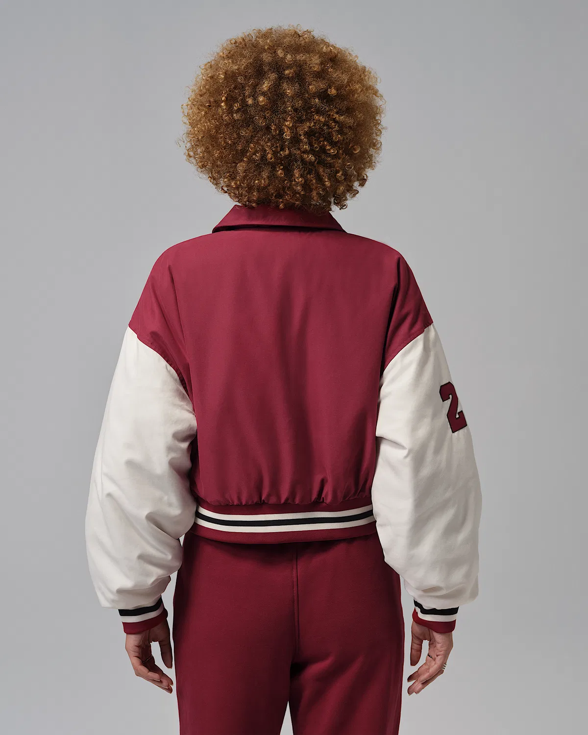 Женская куртка Therma-FIT Varsity Jacket Jordan Brooklyn, Team Red/Pale Ivory/Black — фото 2