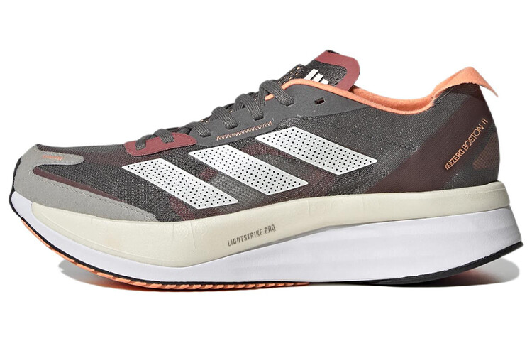 

Кроссовки женские Adizero Boston 11 с низким верхом серые/оранжевые/белые Adidas
