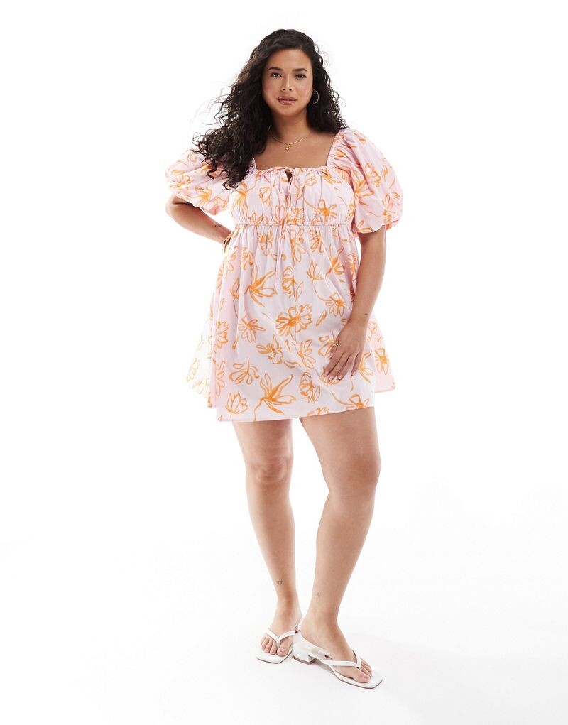 

Комбинезон мини с пышными рукавами ASOS DESIGN Curve оранжевого цвета с цветочным принтом