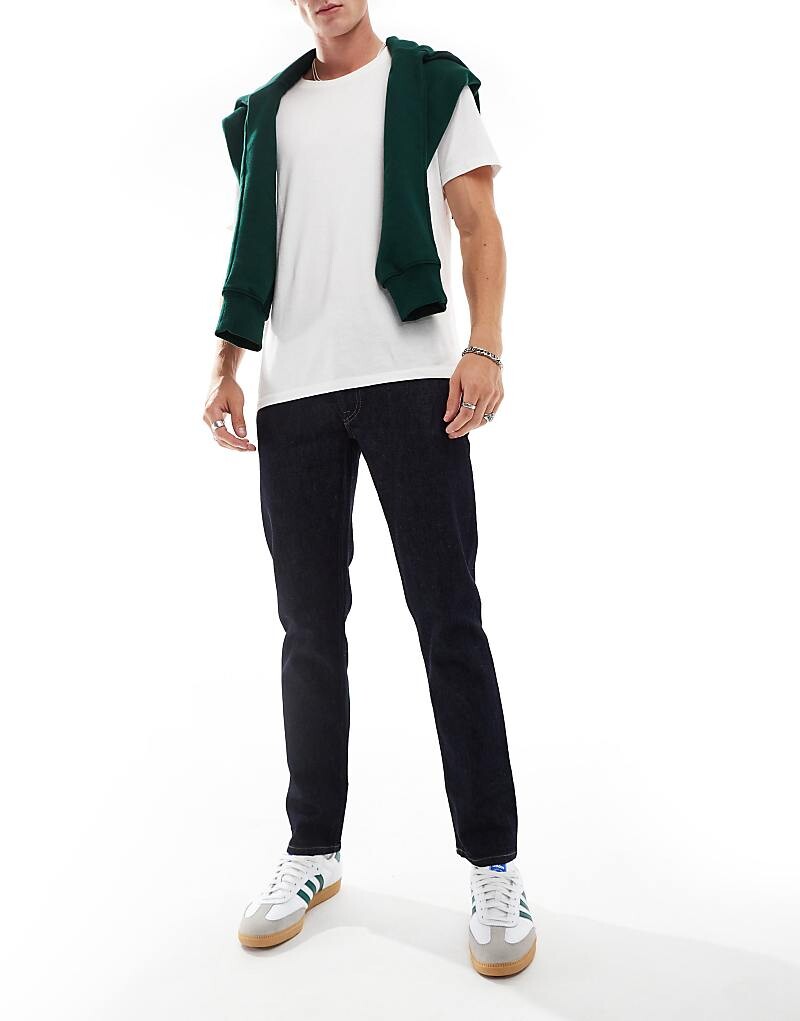 

Голубые джинсы средней длины Lacoste