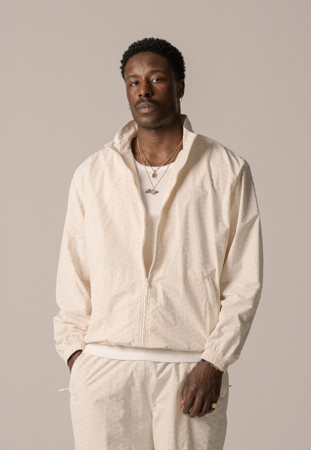 

Тренировочная куртка ALLOVER TRACK JACKET UNISEX BLKVIS, кремовый