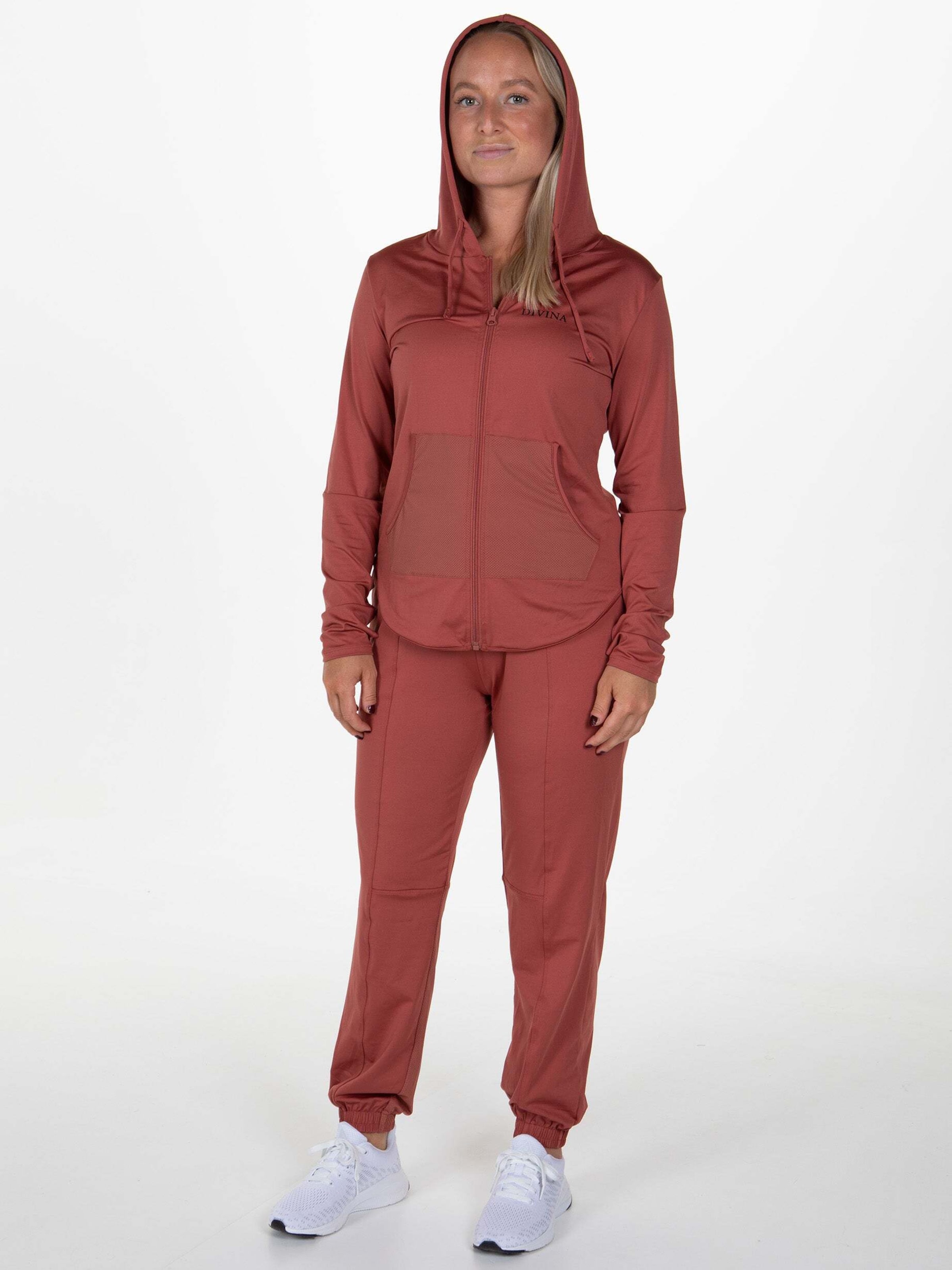 

Divina Тренировочная куртка 'Nui' в пастельно-красном цвете