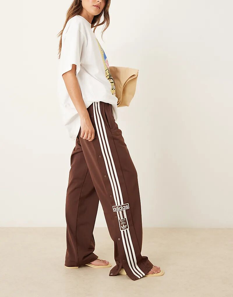 

Спортивные брюки adidas Originals Adibreak коричневого цвета