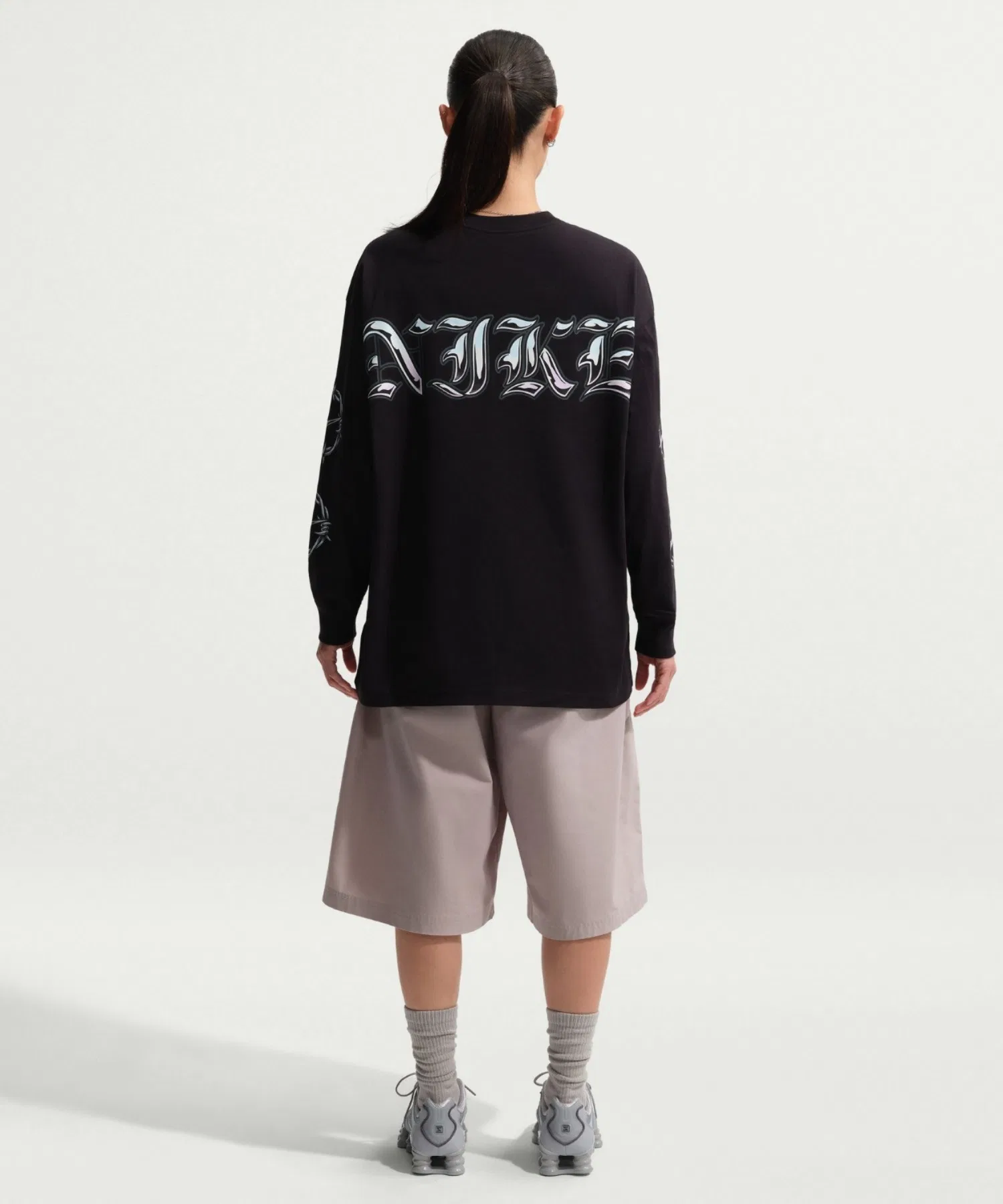 Унисекс футболка оверсайз Nike Sportswear с длинным рукавом чёрная — фото 3