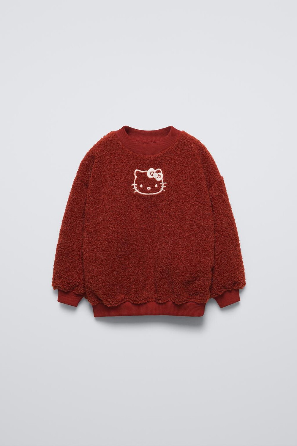 

Толстовка hello kitty sanrio из искусственной овчины с подкладкой ZARA, цвет reddish