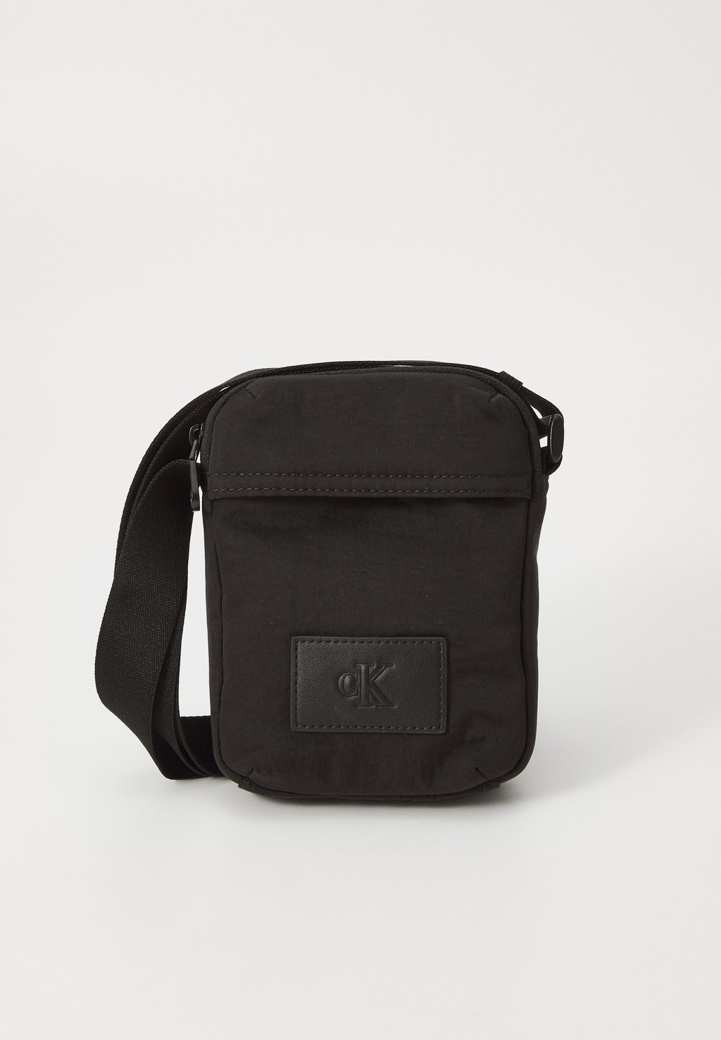 

Сумка через плечо NEW JEANS REPORTER - Across body bag Calvin Klein Jeans, черный