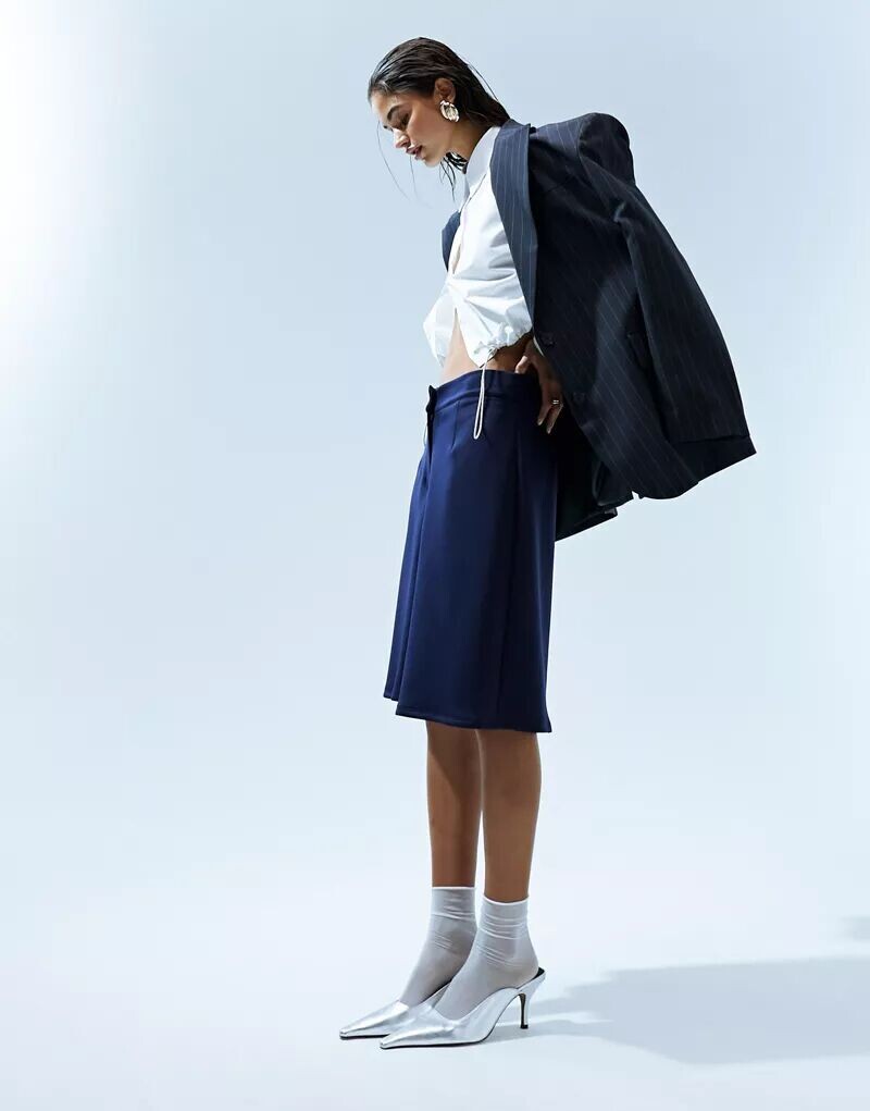 

Темно-синие удлинённые шорты из неопрена ASOS