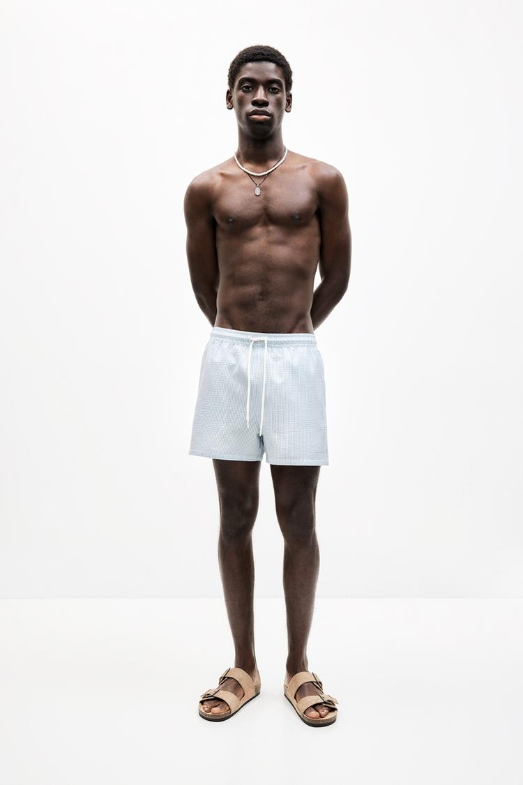 

Плавки полосатые из ткани сирсакер Pull And Bear, синий