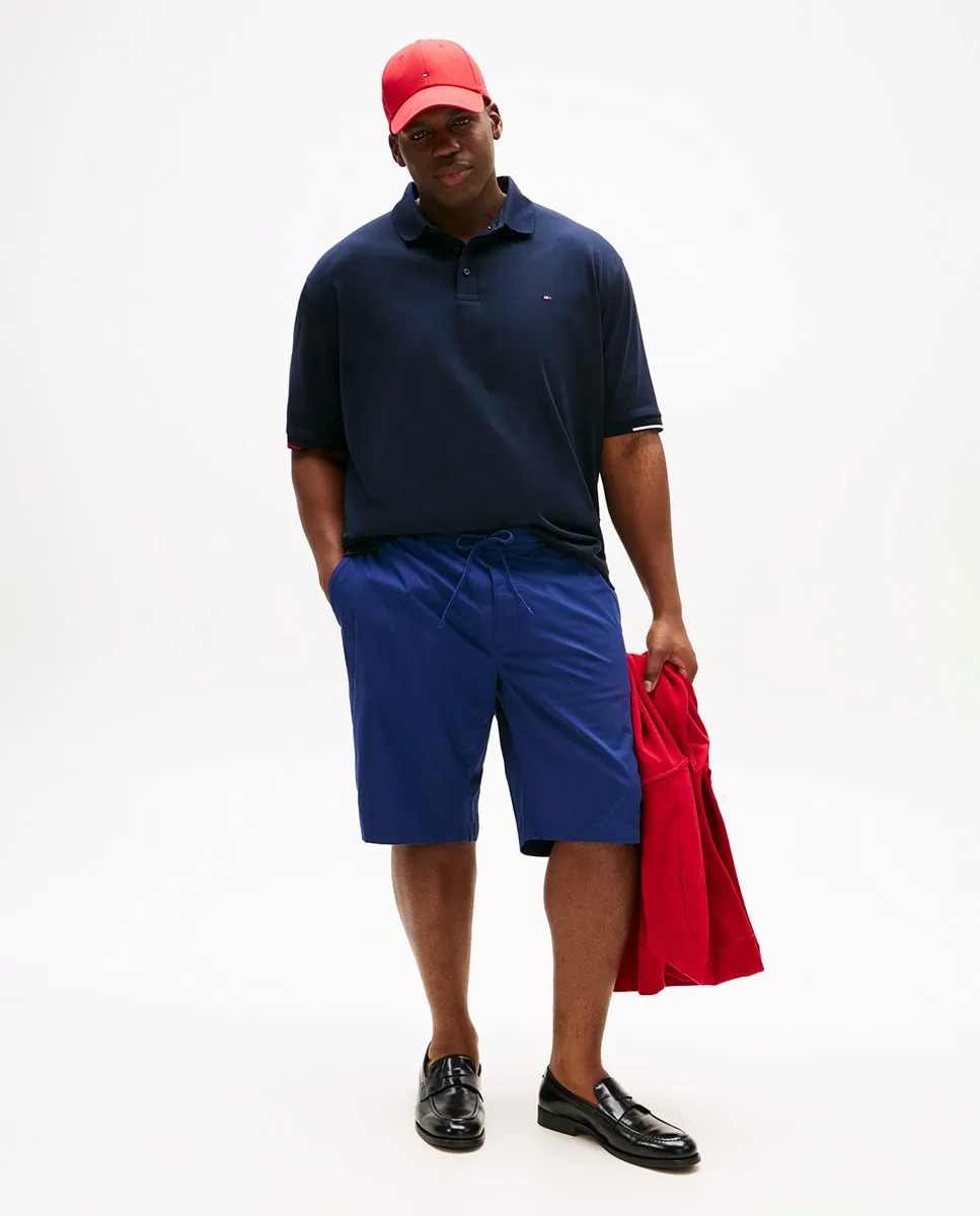 

Мужские шорты Бермуды однотонные с корпоративными деталями, большие размеры Tommy Hilfiger, темно-синий