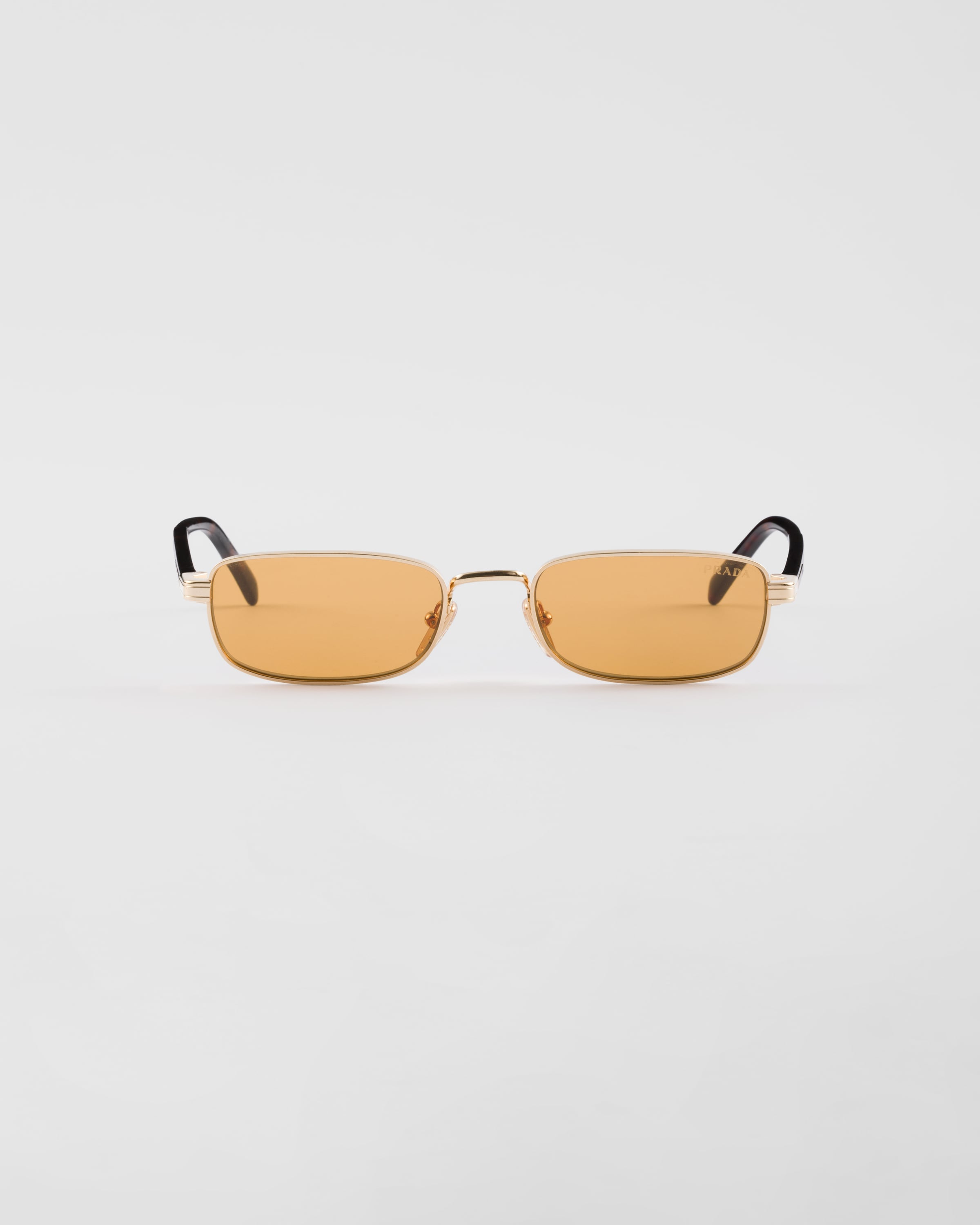 

Солнцезащитные очки с культовой металлической табличкой Prada, оранжевый