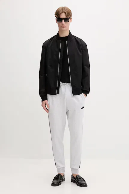 Спортивные штаны с меланжевым узором Essentials Adidas, серый — фото 2