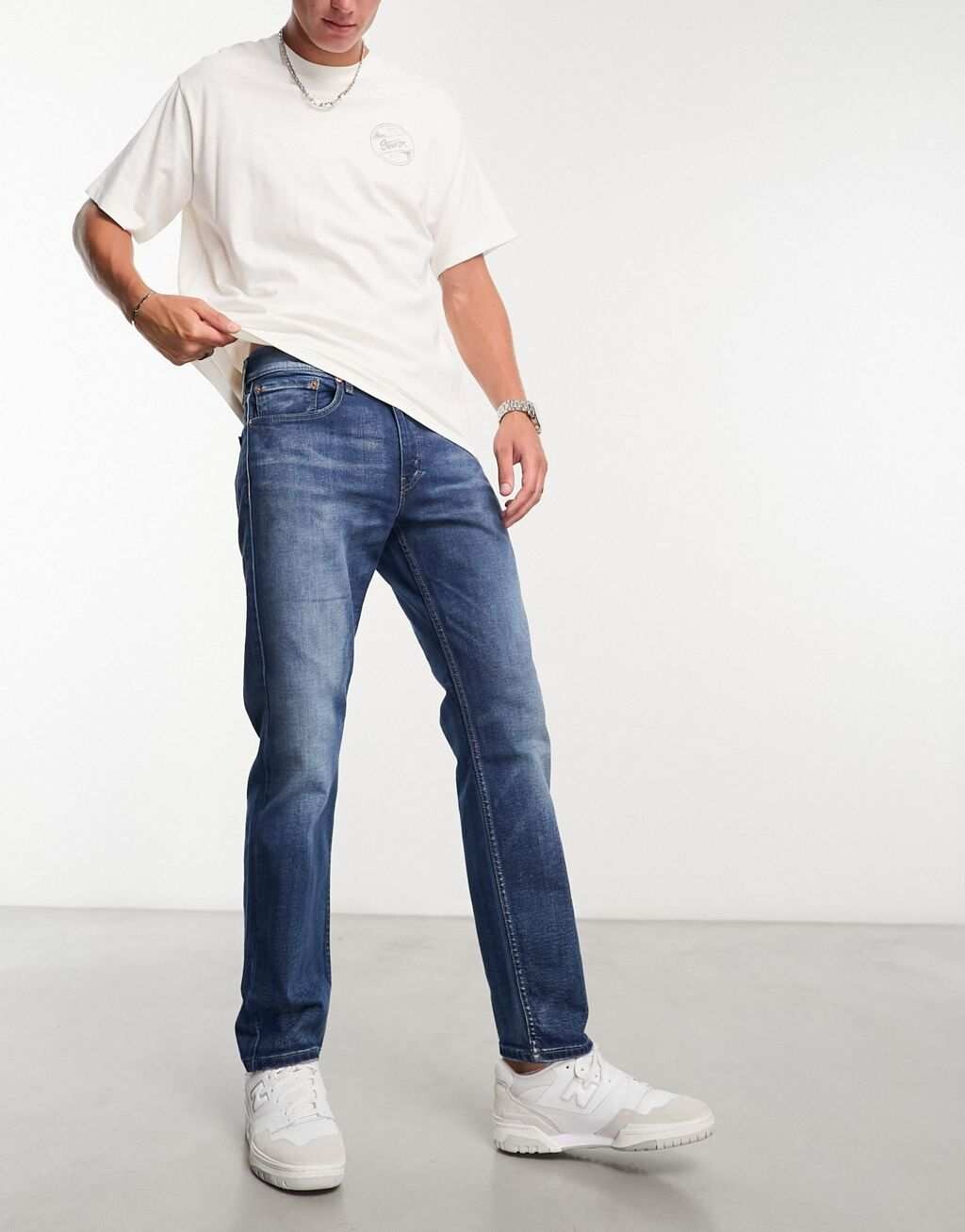 

Темно-синие зауженные джинсы Levi's 502