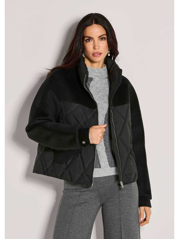 

MADELEINE Элегантная черная пуховая куртка для холодных дней