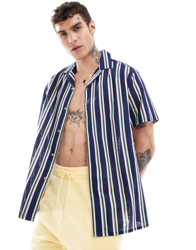 

Синяя льняная рубашка в непринужденную полоску ASOS DESIGN