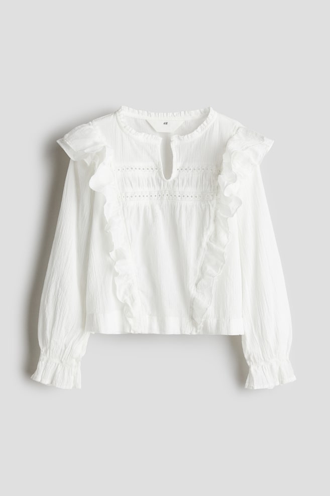 

Хлопковая блузка с воланами H&M, белый