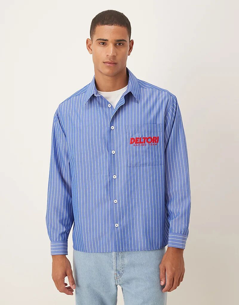 

Рубашка свободного кроя ASOS DESIGN с вышитым логотипом из хлопкового поплина в синюю полоску