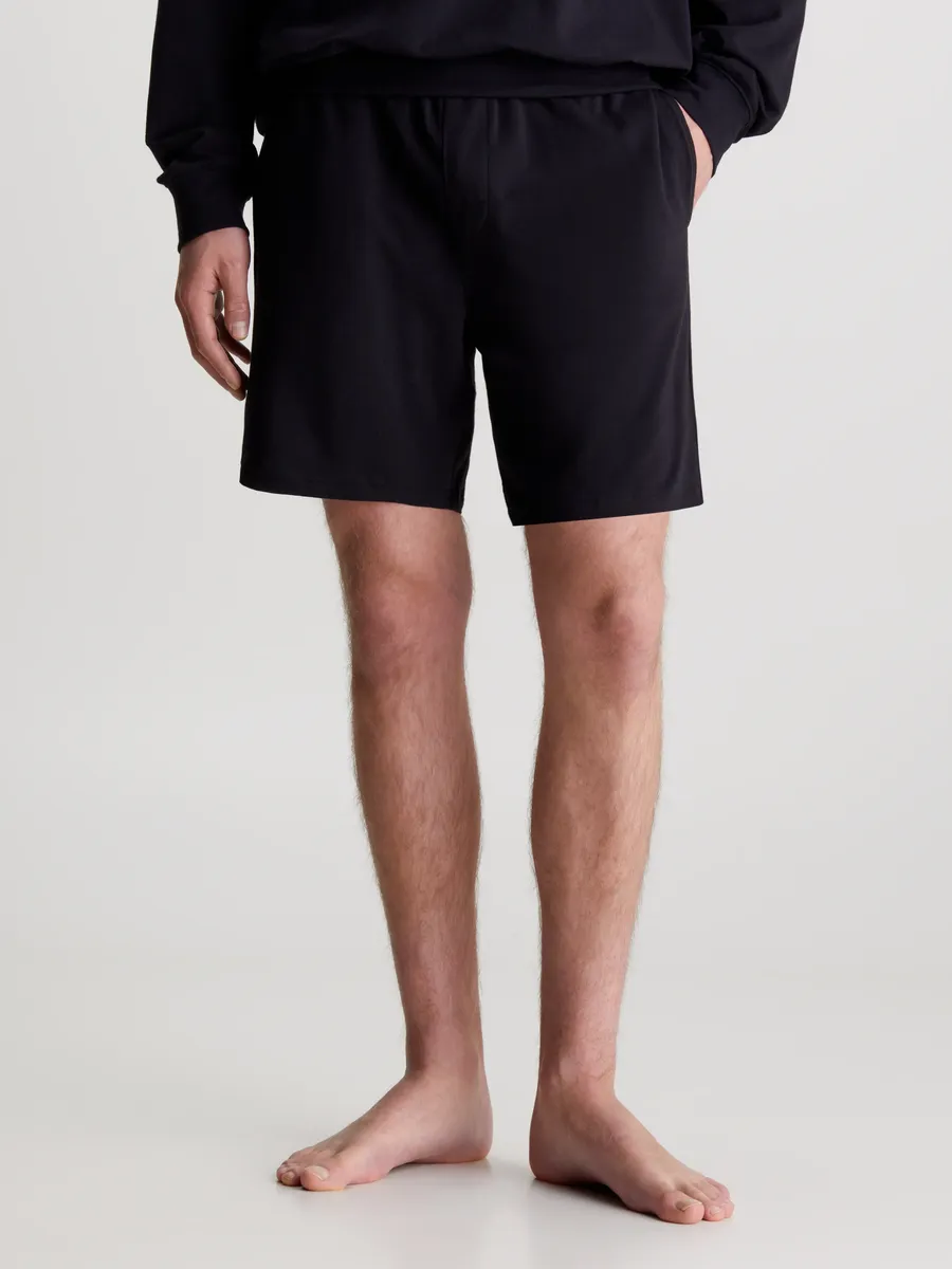 

Пижамные штаны Calvin Klein Underwear "SLEEP SHORT" с надписью логотипа Calvin Klein, черный