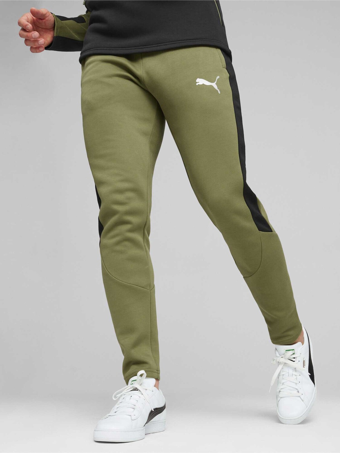 

Спортивные брюки Puma EVOSTRIPE Pants DK, зеленый
