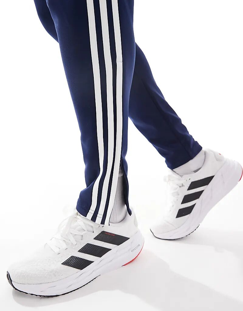 Зимние тренировочные брюки adidas Football Tiro 25 Essentials в цвете Team Navy Blue 2 / Red / White Adidas Performance — фото 3