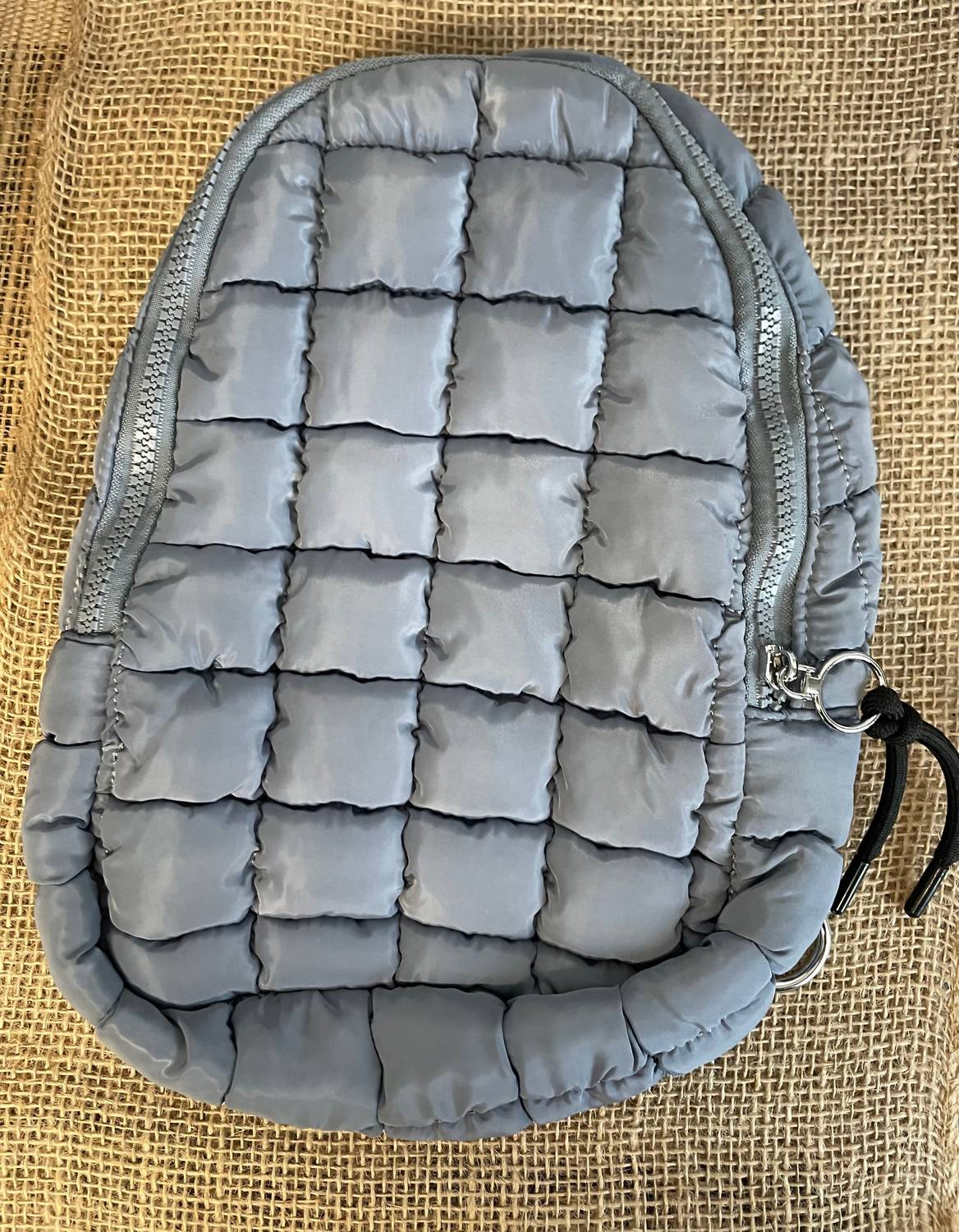 

Слинг-сумка Puffer в синем цвете Wall to Wall