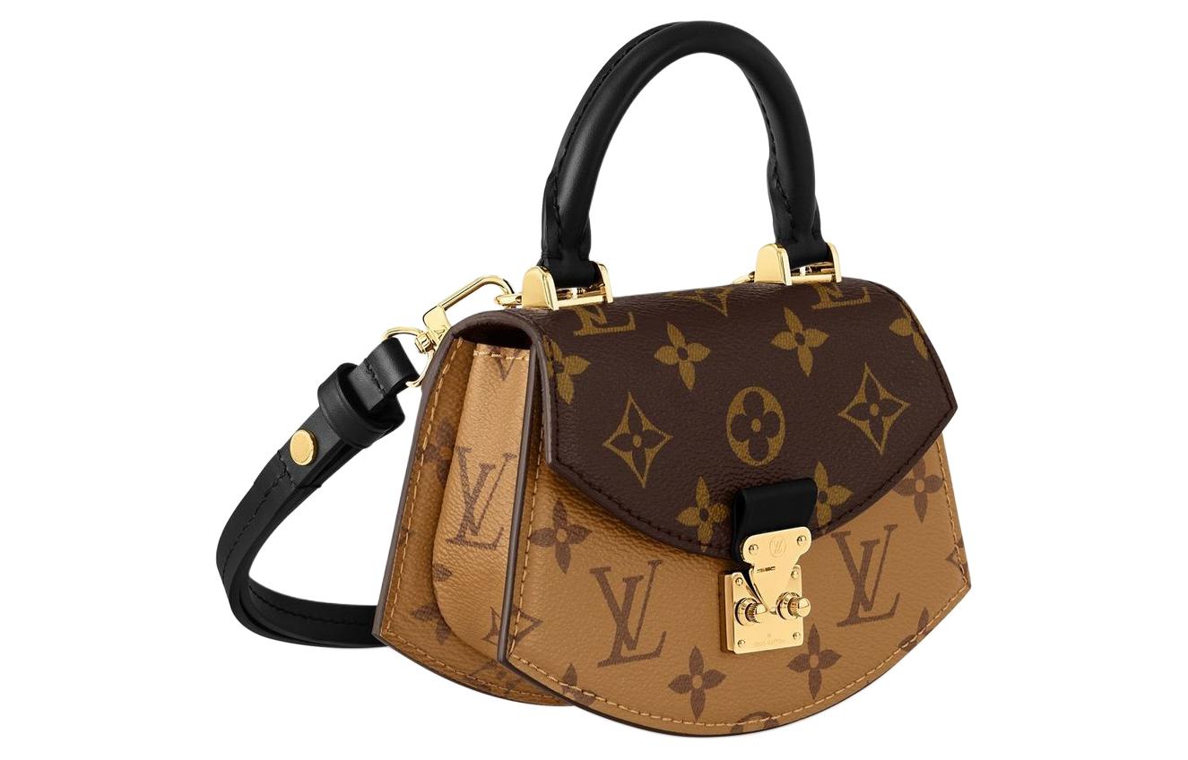 LOUIS VUITTON Сумка-веер из прорезиненной ткани с кожаными вставками — фото 2
