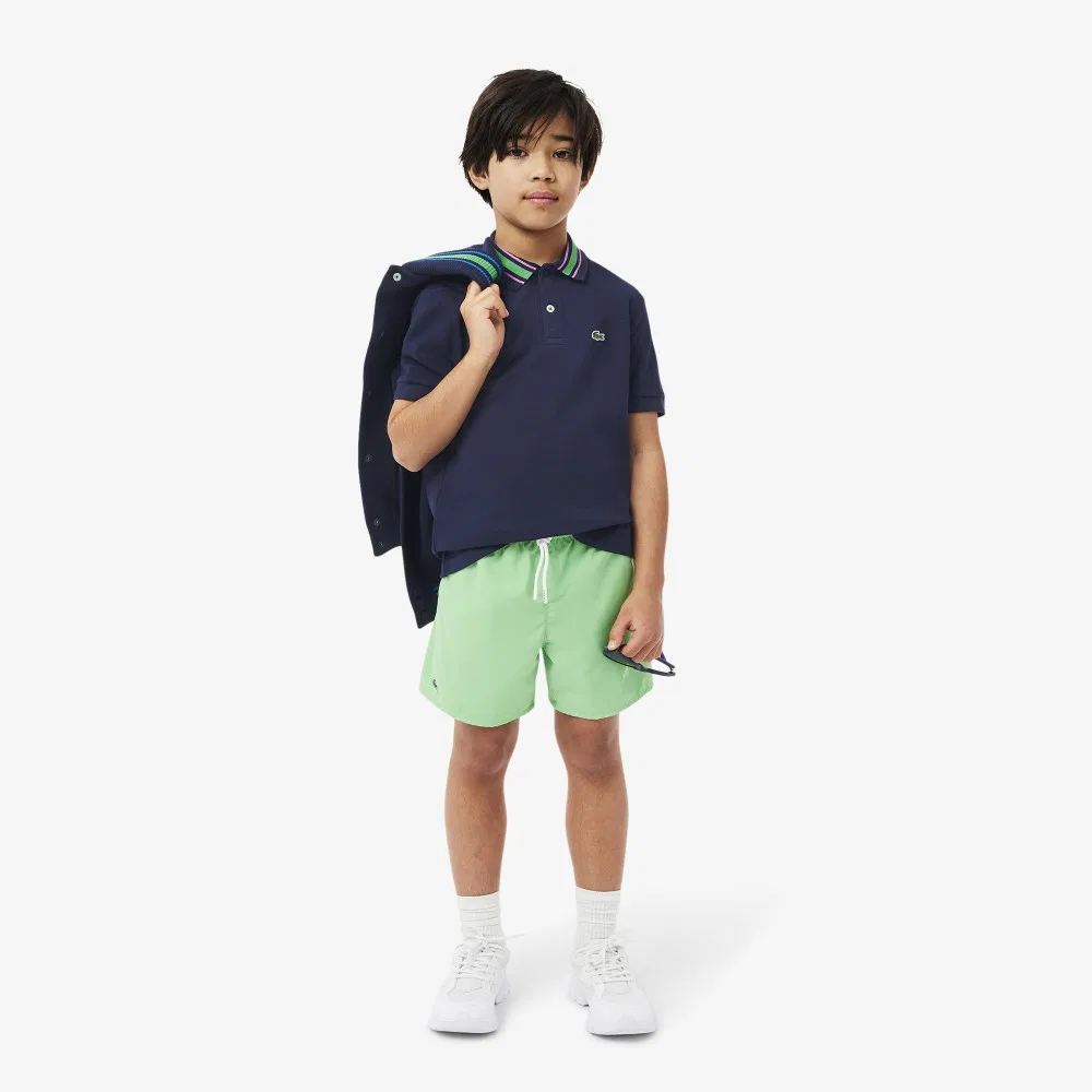 Детское поло с коротким рукавом с акцентным воротником тёмно-синее от Lacoste — фото 4