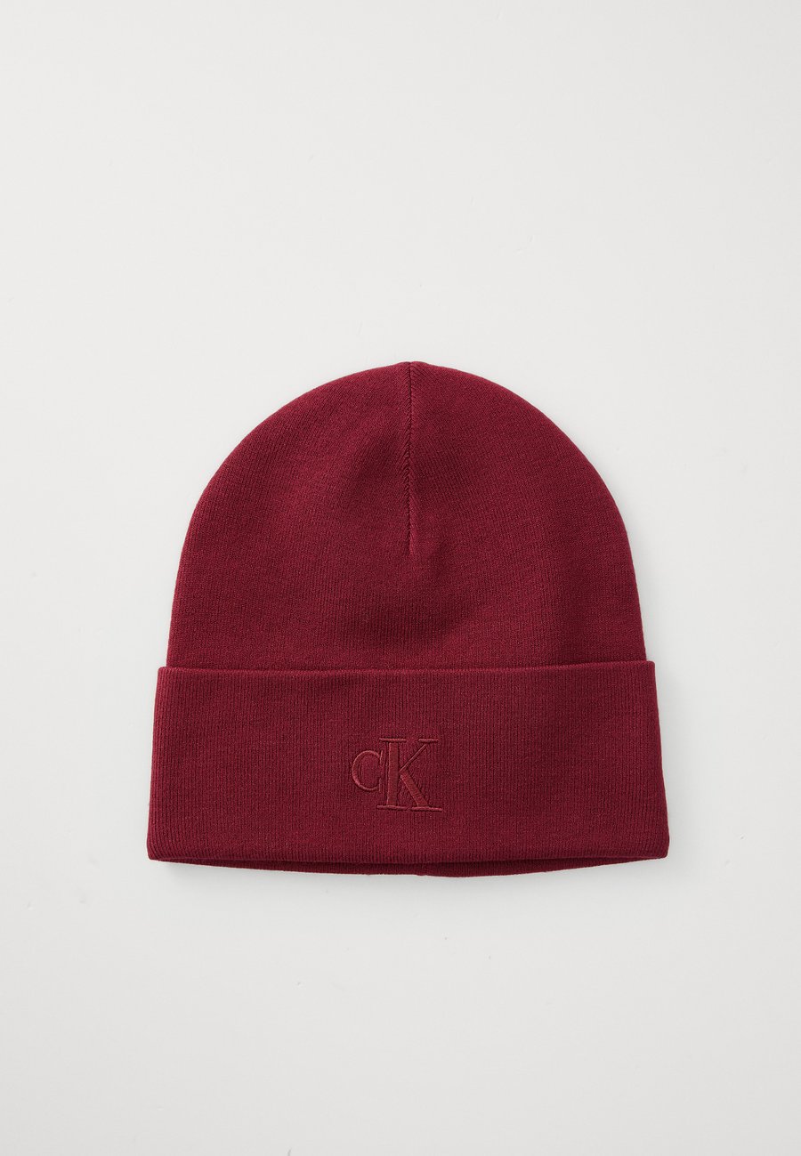 

Шапка Calvin Klein BEANIE UNISEX, Beet Red/Bordeaux