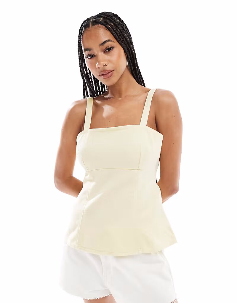

Джинсовый топ с баской и ремешками ASOS DESIGN молочно-желтого цвета