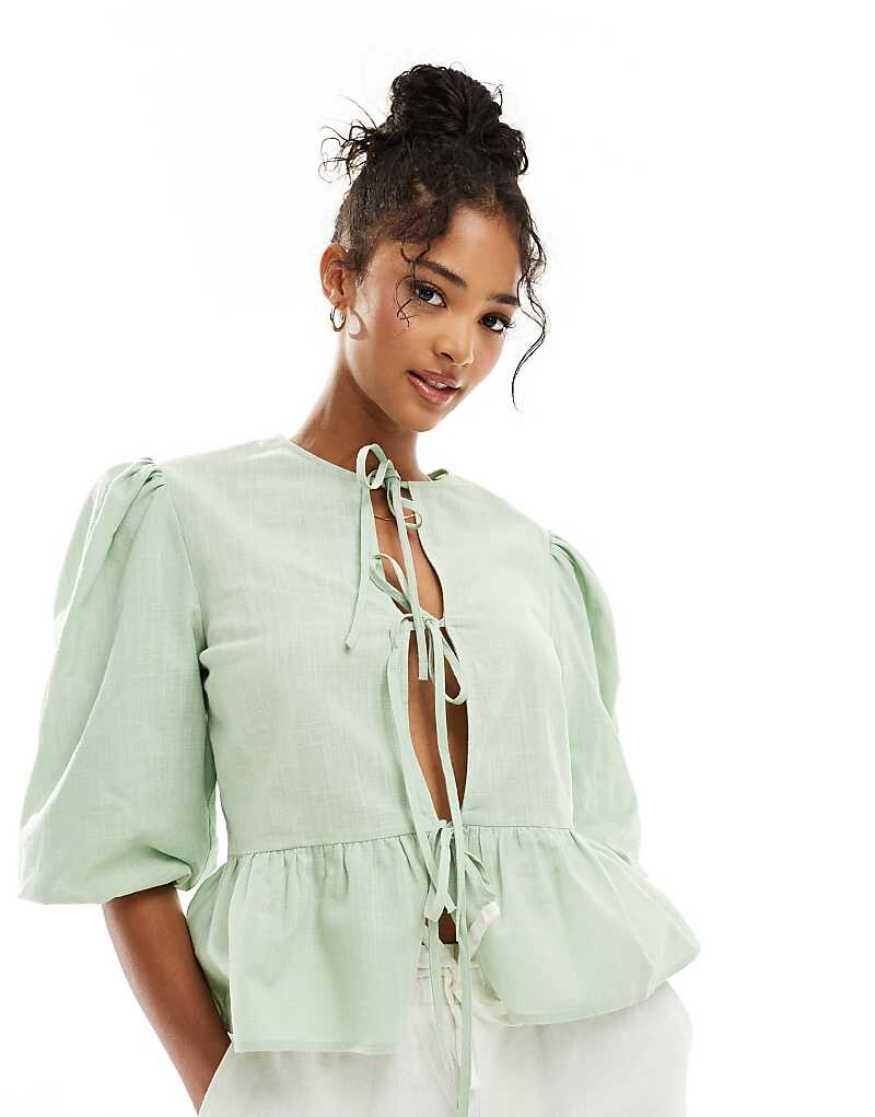 

Зеленая блузка с баской ASOS DESIGN из смесового льна с завязкой спереди