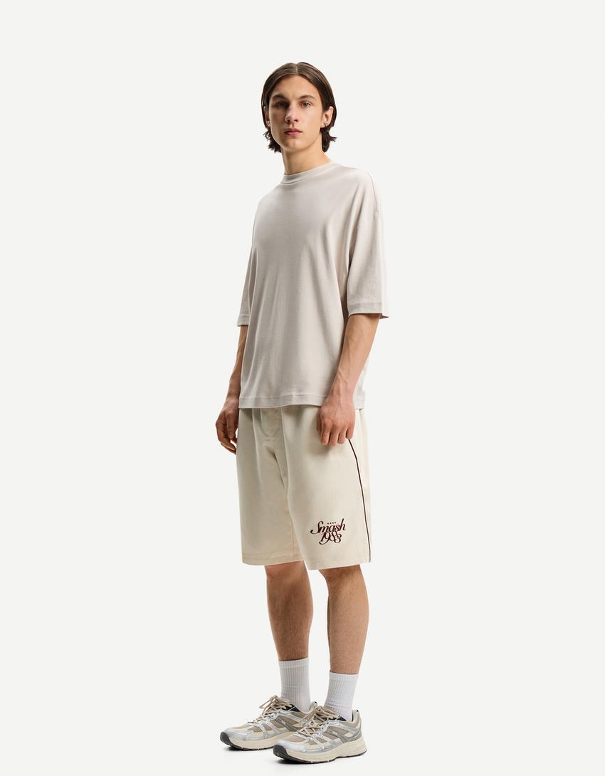 

Технические шорты-бермуды для бега Bershka, желтый