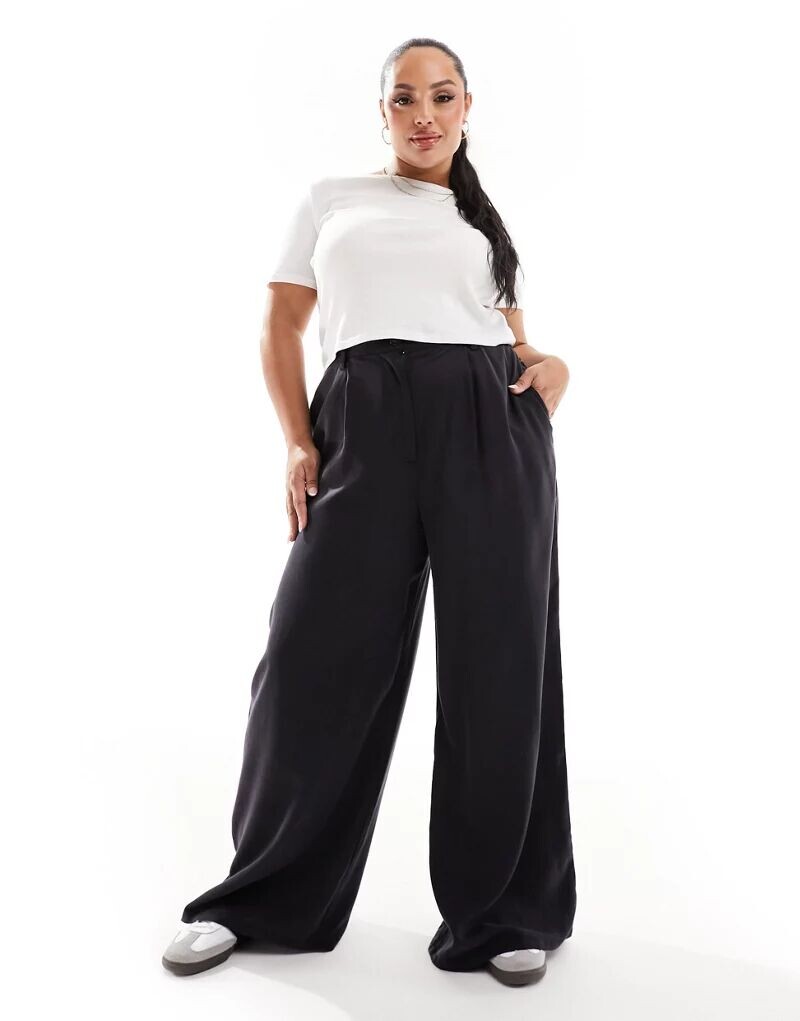 

Черные стираные брюки ASOS Curve Dad