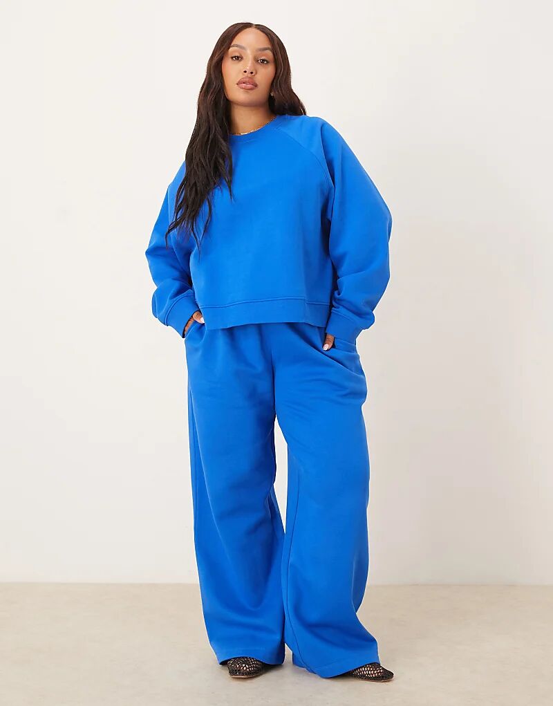 

Широкие спортивные брюки с защипом сзади ASOS DESIGN Curve синего цвета Asos Curve