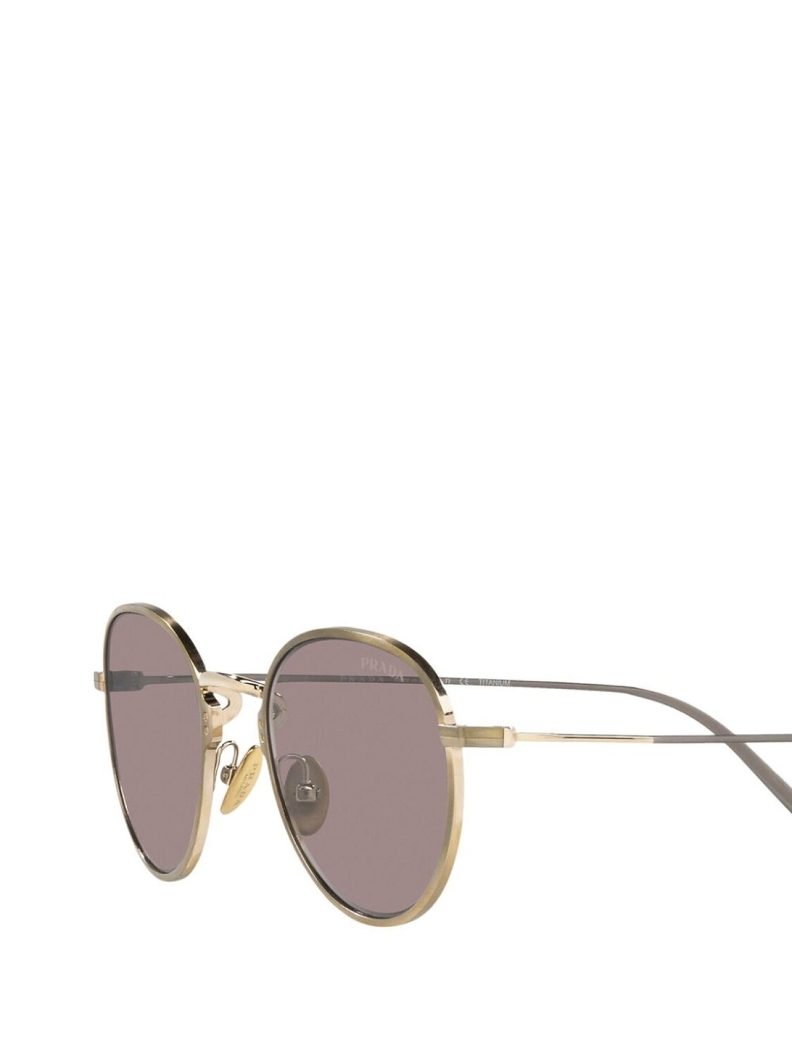 

Солнцезащитные очки в безободковой оправе Prada Eyewear, золотистый