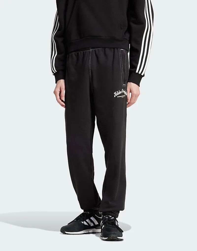 

Спортивные брюки Wabash черного цвета adidas Originals