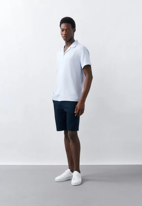 Прямые, утонченные, эластичные шорты Calvin Klein, Dark Sapphire — фото 2