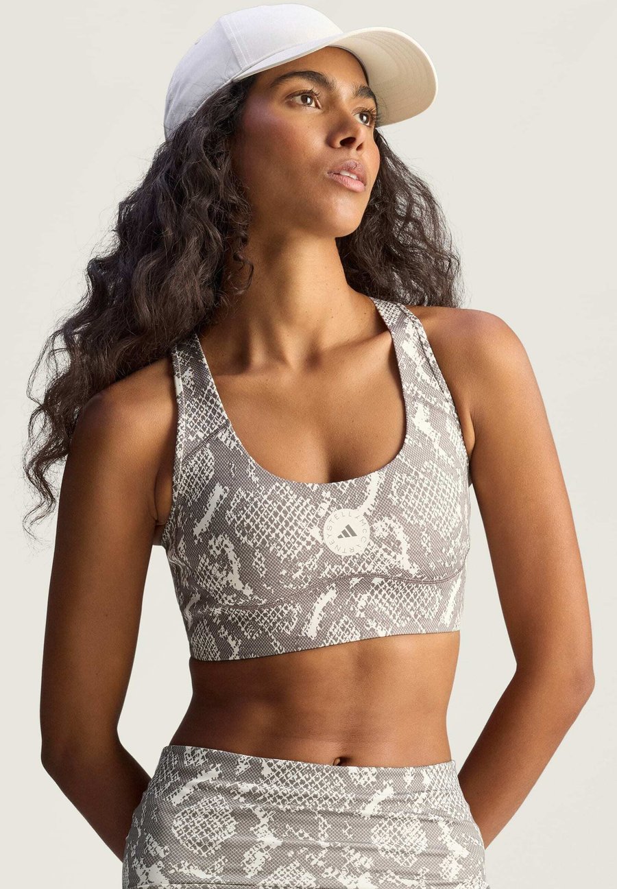 

Бюстгальтер Adidas by Stella McCartney POWER IMPACT PRINTED, Almond Milk-Smc Charcoal/Beige