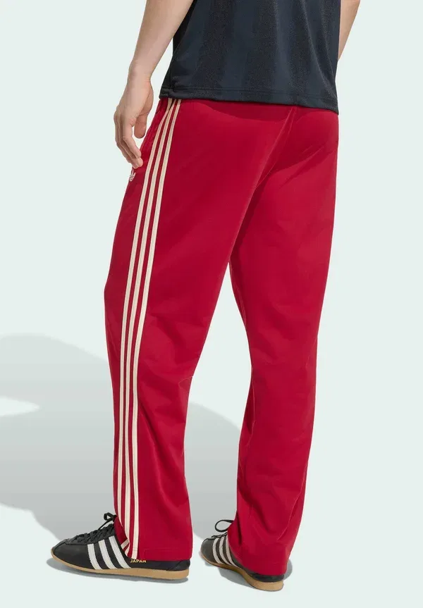 Спортивные штаны Firebird tp tracksuit bottoms Adidas Originals, командно-красный/теплый ванильный — фото 2